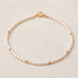 PULSEIRA COM PÉROLAS DE GRÃO E BOLAS DE OURO