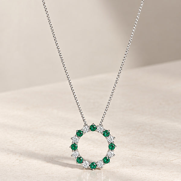 COLGANTE CIRCULO CON ESMERALDAS Y DIAMANTES