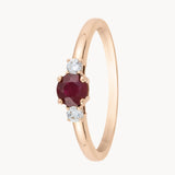 ANILLO RUBI EN GARRAS CON DIAMANTES A LOS LADOS