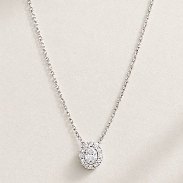 OVAL-CUT PENDANT WITH DIAMOND HALO