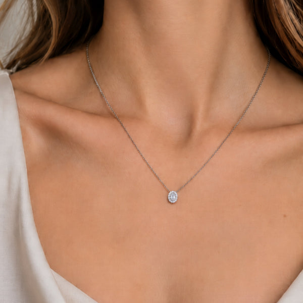 OVAL-CUT PENDANT WITH DIAMOND HALO