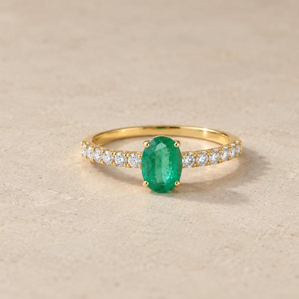 OVAL EMERALD RING WITH SIDE DIAMONDS