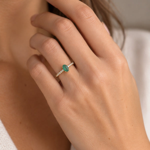 OVAL EMERALD RING WITH SIDE DIAMONDS