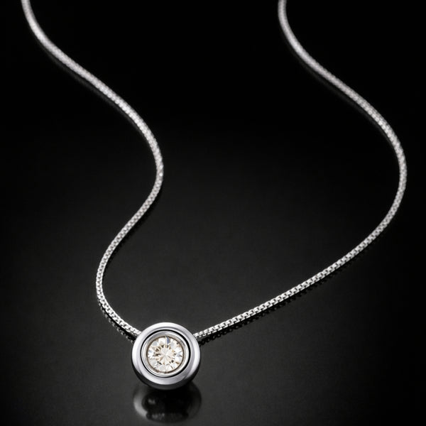 COLGANTE DIAMANTE CHATON 0.25 QUILATES PUNTO DE LUZ