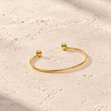 OPEN RIGID BANGLE WITH BEADS