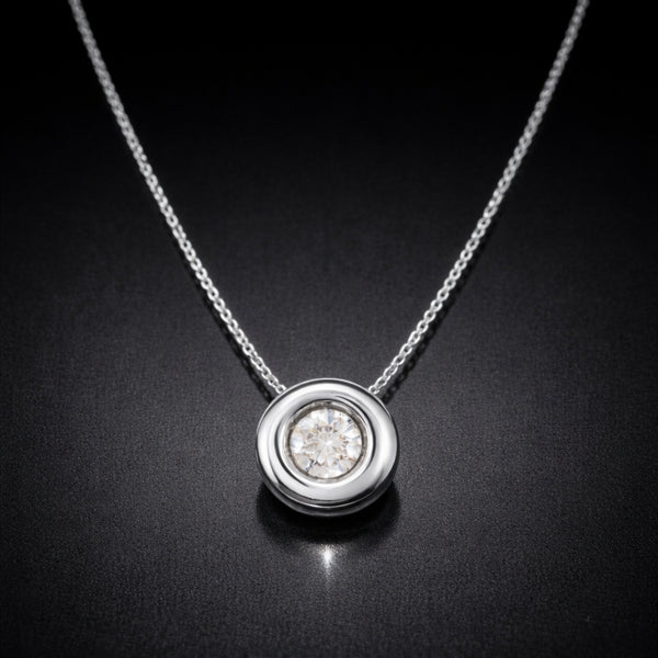 COLGANTE DIAMANTE CHATON 0.40 QUILATES PUNTO DE LUZ