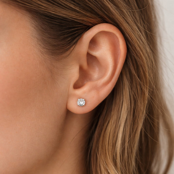 PENDIENTES CON DIAMANTE GARRAS 0.60 QUILATES PUNTO DE LUZ CERTIFICADO IGI