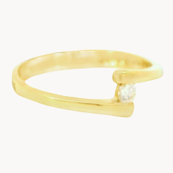 ANILLO SOLITARIO CRUZADO CON DIAMANTE 0.080 QUILATES EMELIA