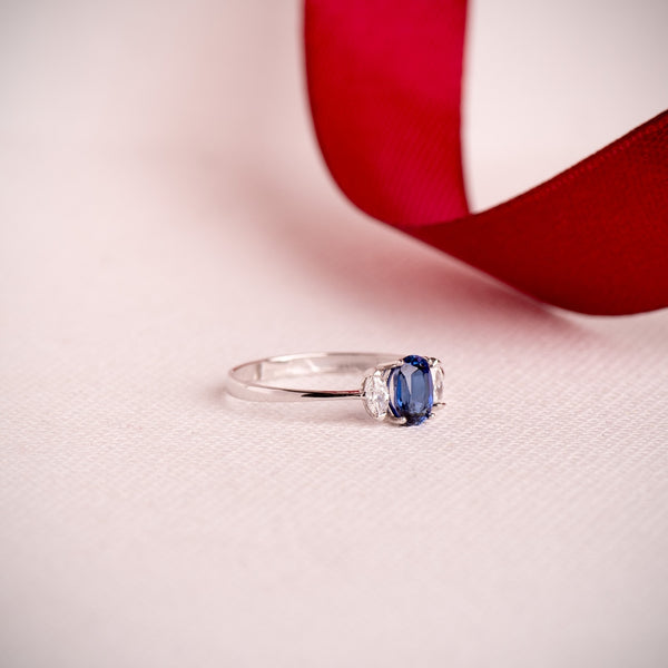 OVAL SAPPHIRE AND MARQUISE CREATED DIAMOND RING