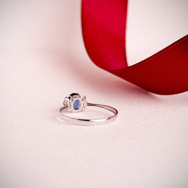 OVAL SAPPHIRE AND MARQUISE CREATED DIAMOND RING