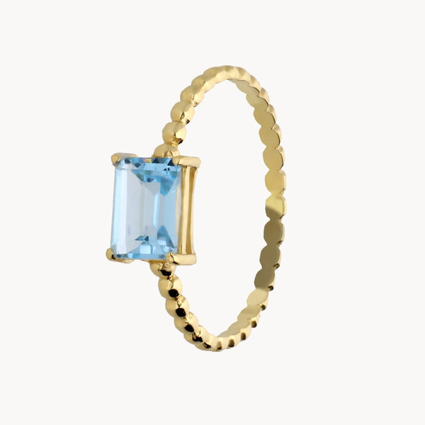Anillo Oro 18kt bolas con topacio azul Laila
