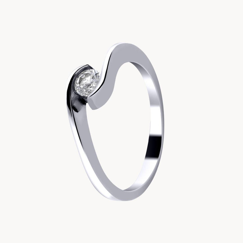 Anillo solitario cruzado Oro blanco 18kt con diamante 0.20 quilates Pia