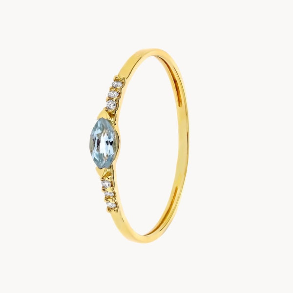Anillo Oro 18kt con topacio azul y diamantes Neda