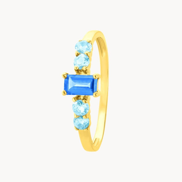 Anillo Oro 18 kilates con topacio London Blue y topacios azules Feray