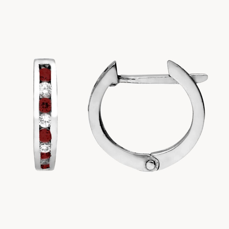 Aros Oro blanco 18kt carril rubies diamantes Cara