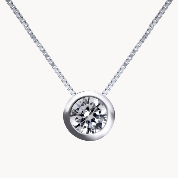 Colgante Oro blanco 18kt diamante chatón 0.40 quilates Taylor