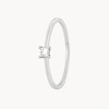 ANILLO SOLITARIO CUATRO GARRAS CON DIAMANTE TALLA PRINCESA 0.13 QUILATES ELIANA