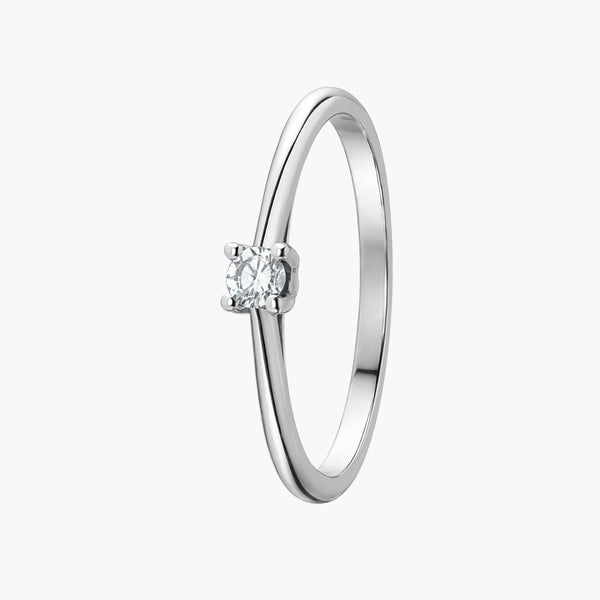 ANILLO SOLITARIO CUATRO GARRAS CON DIAMANTE 0.12 QUILATES GERTIE