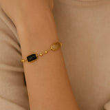 PULSERA CON CUARZOS RUTILADOS Y BOLAS ORO SATINADO