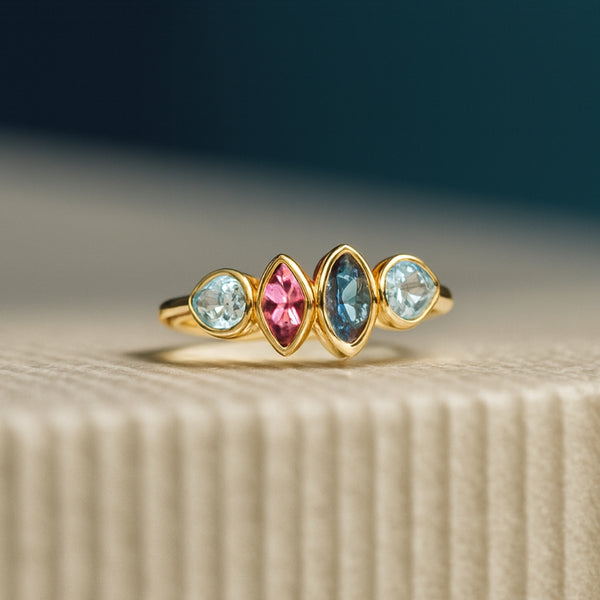 ANILLO CON TOPACIO LONDON BLUE, TOPACIOS AZULES Y AMATISTA RAINE