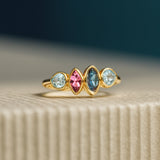 ANILLO CON TOPACIO LONDON BLUE, TOPACIOS AZULES Y AMATISTA RAINE