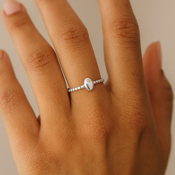 ANILLO BOLITAS CON DIAMANTE NONA