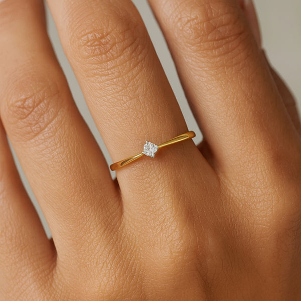 ANILLO SOLITARIO BICOLOR CON DIAMANTE ROMBO 0.11 QUILATES MERITA