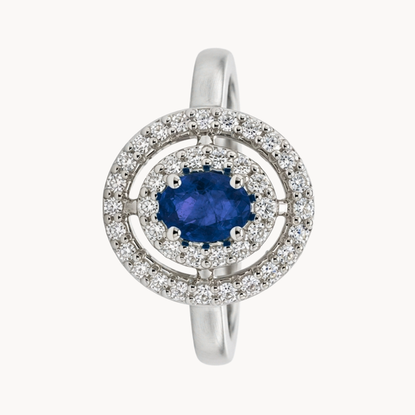 ANILLO ZAFIRO OVAL CON DOBLE HALO DE DIAMANTES