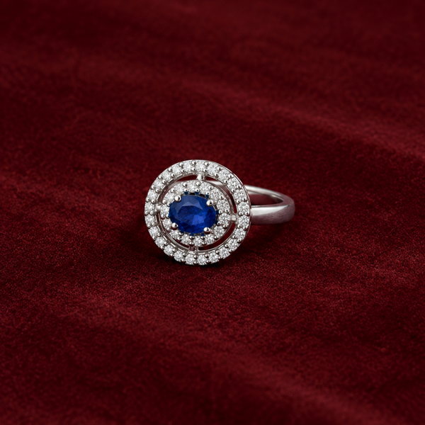 ANILLO ZAFIRO OVAL CON DOBLE HALO DE DIAMANTES