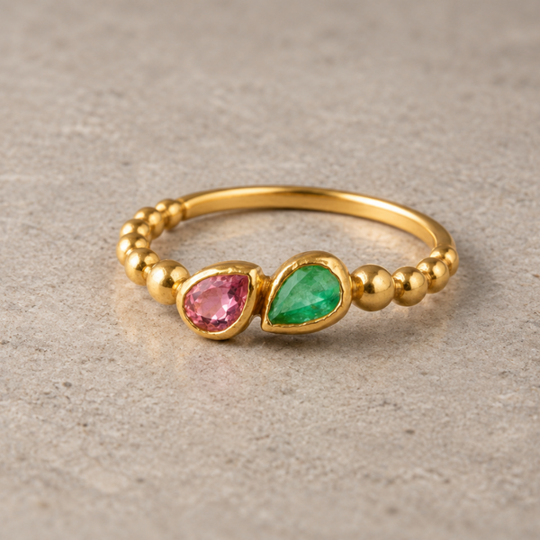 ANILLO BOLAS ESMERALDA Y TOPACIO ROSA PERILLA