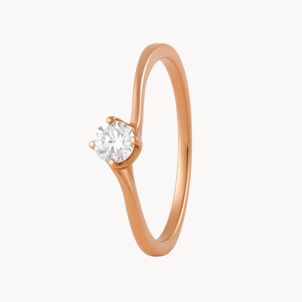 ANILLO SOLITARIO CUATRO GARRAS CRUZADO CON DIAMANTE 0.10 QUILATES AIRI