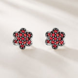 PENDIENTES ESTRELLA CIRCONITAS ROJAS COLEEN