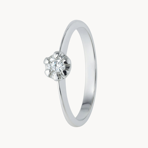 ANILLO SOLITARIO FLOR CON DIAMANTE 0.10 QUILATES GENIE