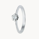 ANILLO SOLITARIO FLOR CON DIAMANTE 0.10 QUILATES GENIE