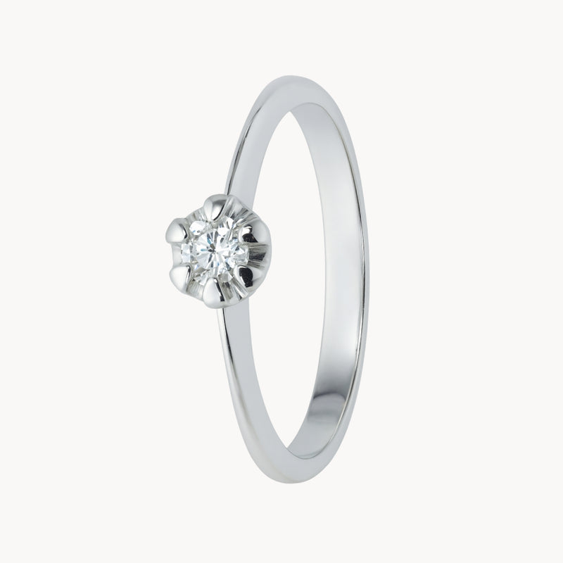 ANILLO SOLITARIO FLOR CON DIAMANTE 0.10 QUILATES GENIE