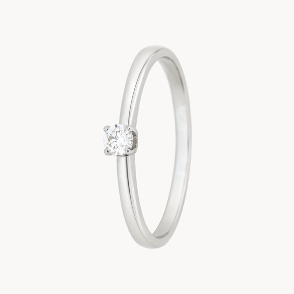 ANILLO SOLITARIO CUATRO GARRAS CON DIAMANTE 0.13 QUILATES LESLIE