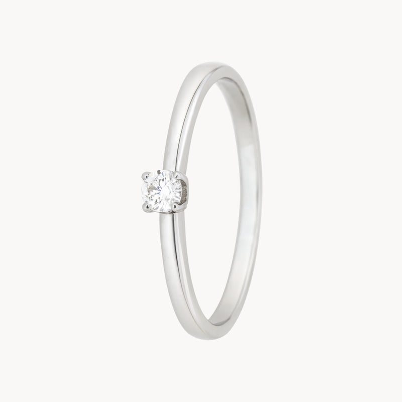 ANILLO SOLITARIO CUATRO GARRAS CON DIAMANTE 0.13 QUILATES LESLIE