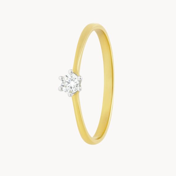 ANILLO SOLITARIO BICOLOR SEIS GARRAS CON DIAMANTE 0.11 QUILATES MERITA