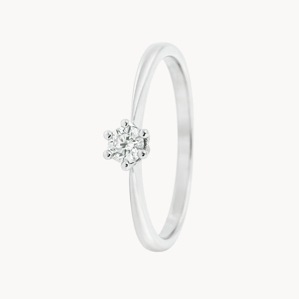 ANILLO SOLITARIO SEIS GARRAS CON DIAMANTE 0.17 QUILATES NELLA
