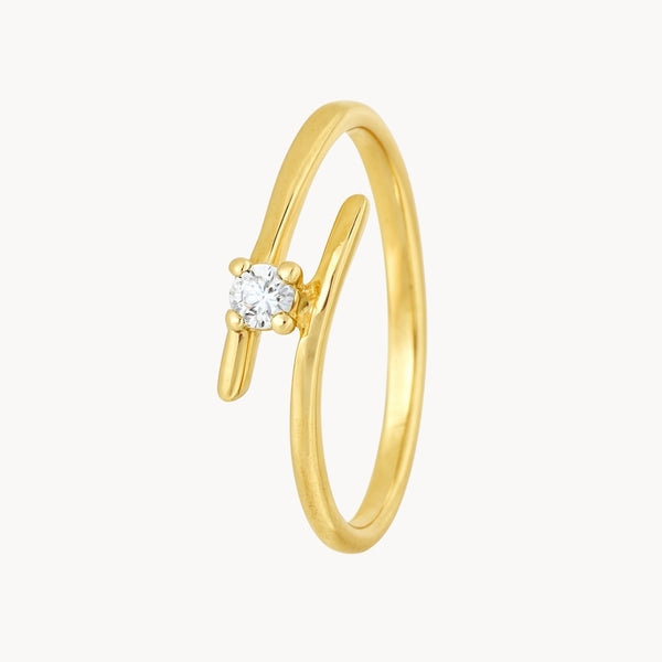 ANILLO SOLITARIO CRUZADO CON DIAMANTE 0.10 QUILATES NOLA
