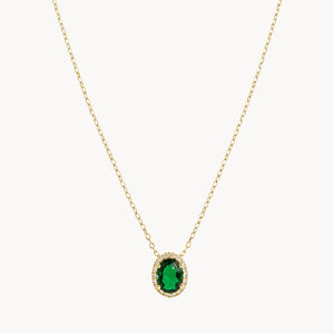 COLGANTE OVALADO CON ESMERALDA Y ORLA DE DIAMANTES