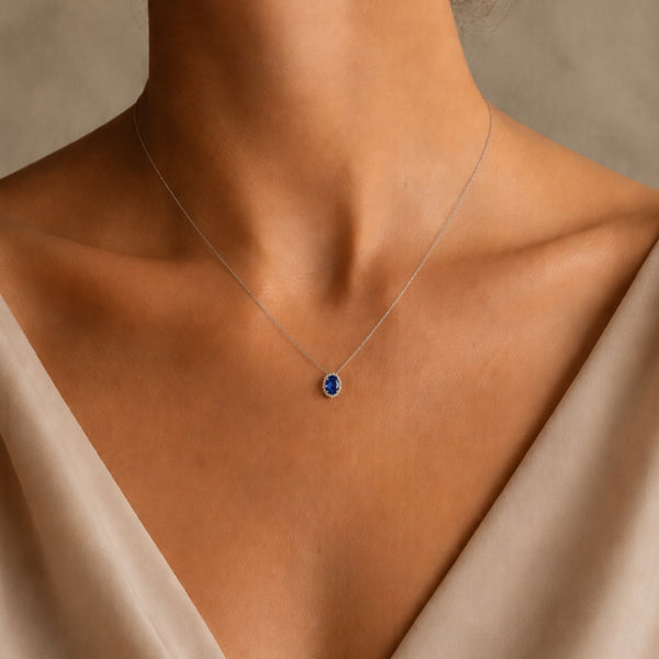 OVAL PENDANT WITH SAPPHIRE AND DIAMOND HALO