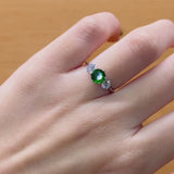 GREEN ZIRCONIA RING AND WHITE ZIRCONIAS ERMA