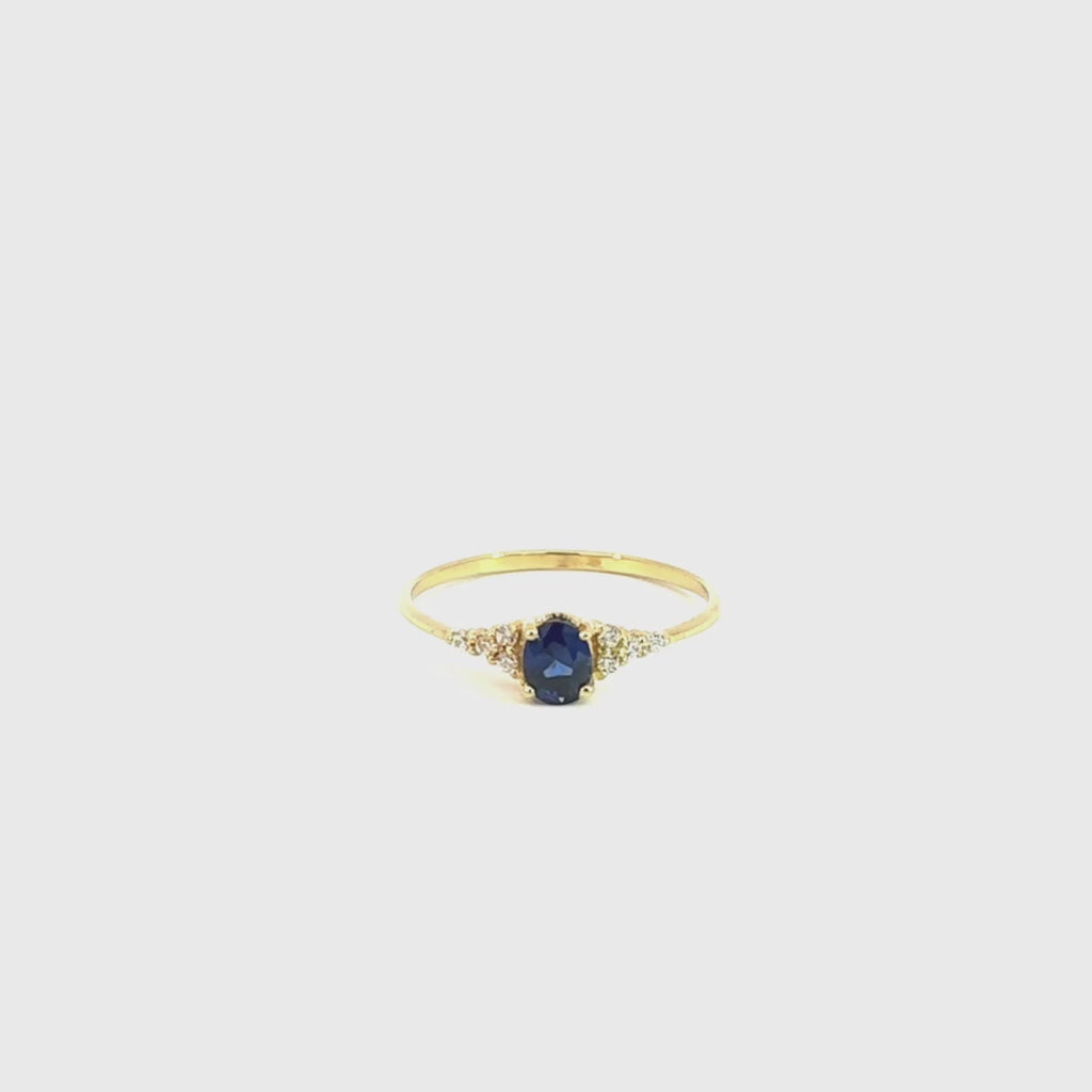 Anillo Oro 18kt con topacio london blue y circonitas Giovanna