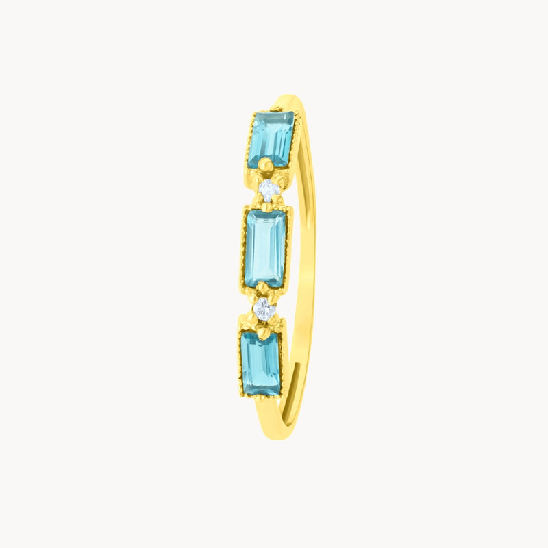 Anillo Oro 18kt topacios London Blue y diamantes